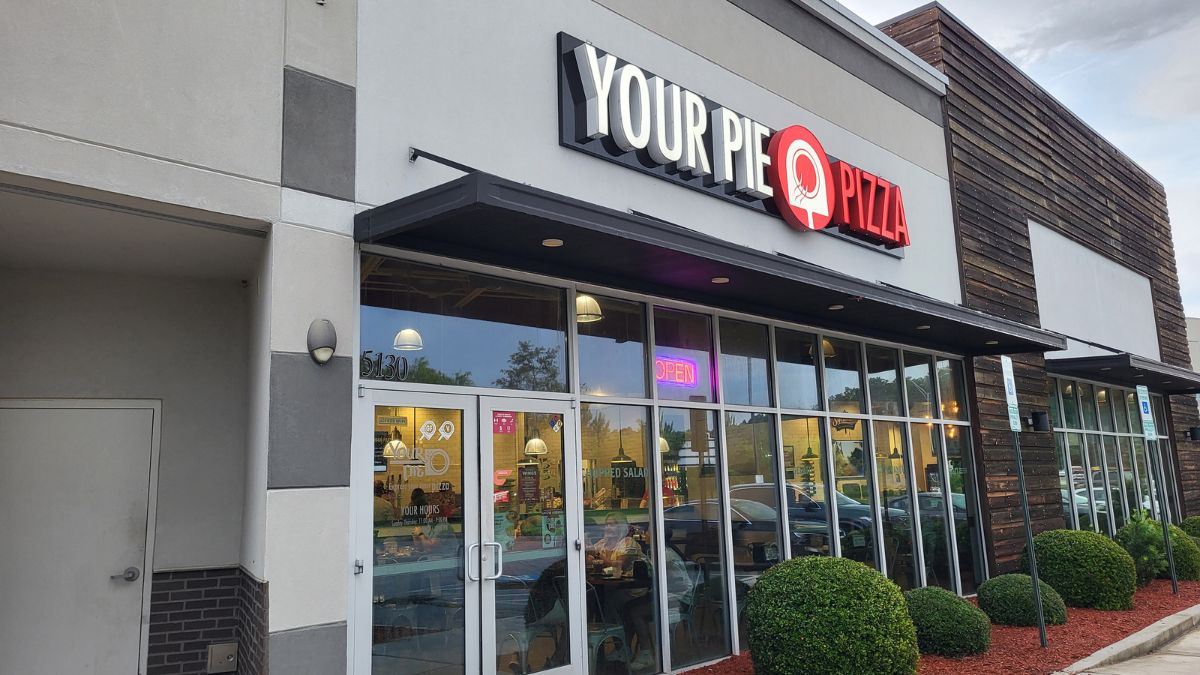 Exterior view of Your Pie Pizza restaurant in Lumberton, North Carolina, located just steps from the SpringHill Suites hotel.