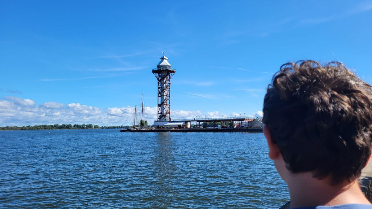 View of Bicentennial Tower on the Erie waterfront with Lake Erie and docks in the background