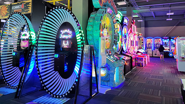 Arcade games inside GameTime Daytona, a popular teen-friendly entertainment spot near ONE Daytona