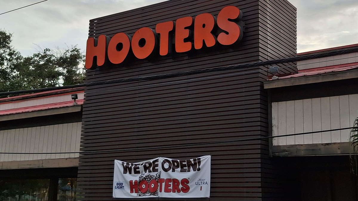 Exterior of Hooters just outside of ONE Daytona, a casual restaurant known for wings and sports near Daytona International Speedway