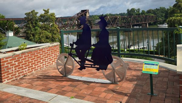 Augusta Riverwalk sculpture with Savannah River and bridge views in downtown Augusta Georgia